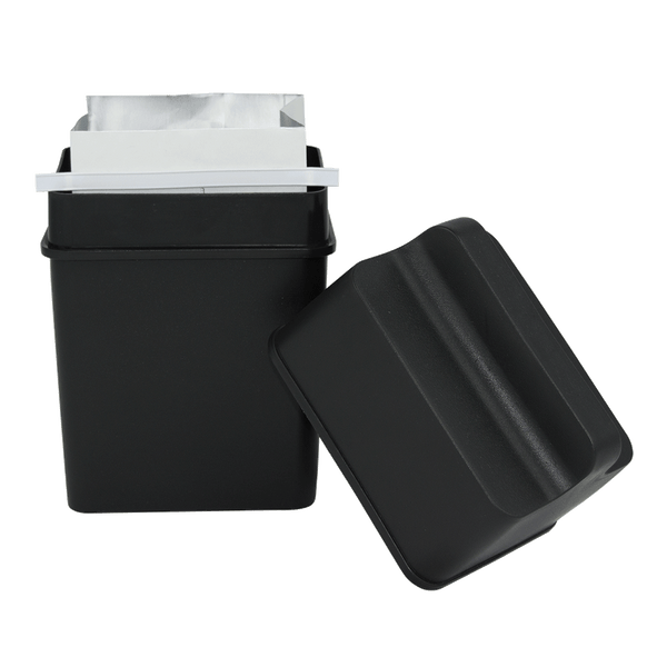 Fat trapper system open with bag in container and lid leaning up against the base