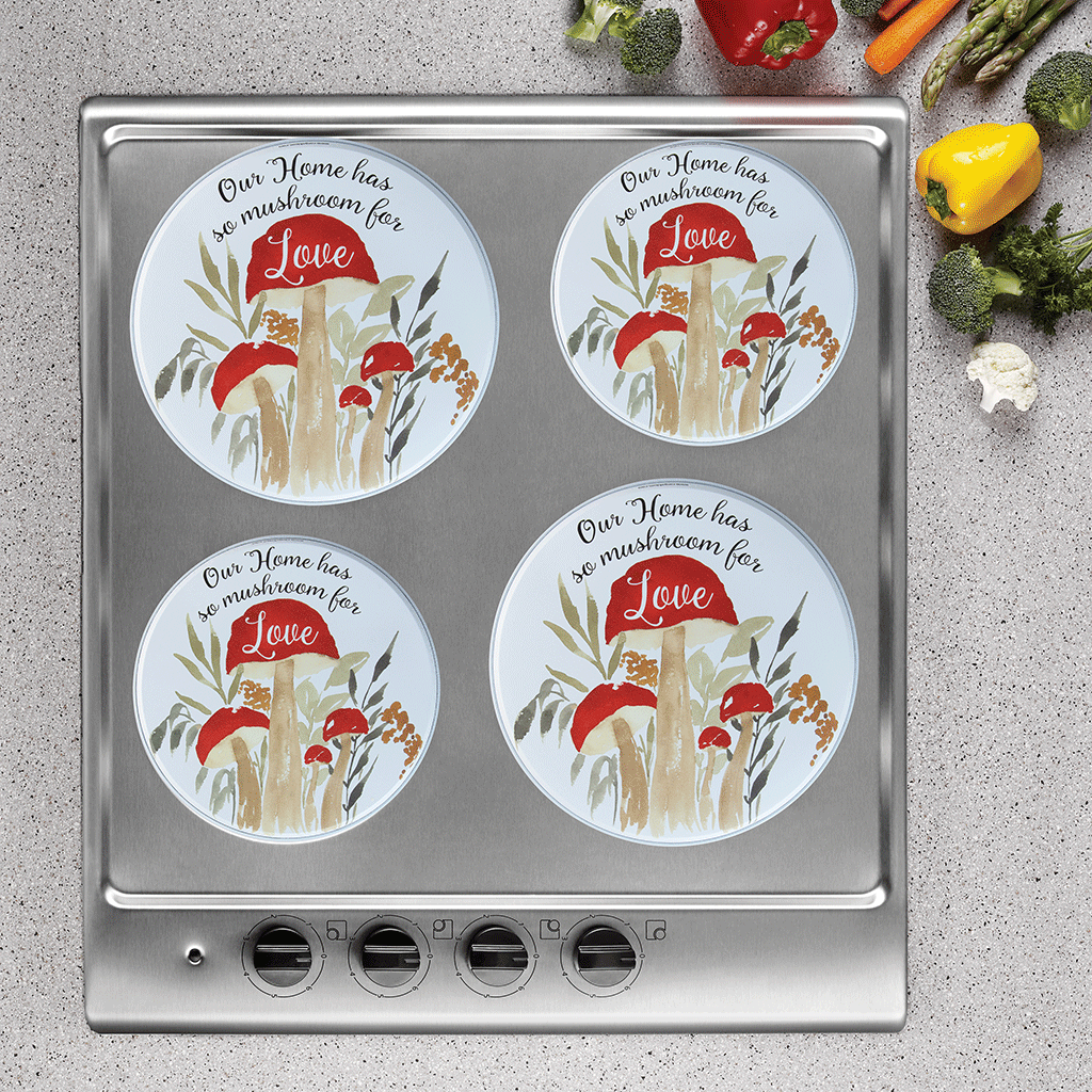 Mushroom burner covers with text "our home has so mushroom for love" on range