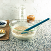 Taste of Home Spatula in Sea Green, mixing batter in bowl