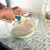 Taste of Home Spatula in Sea Green, mixing batter in bowl